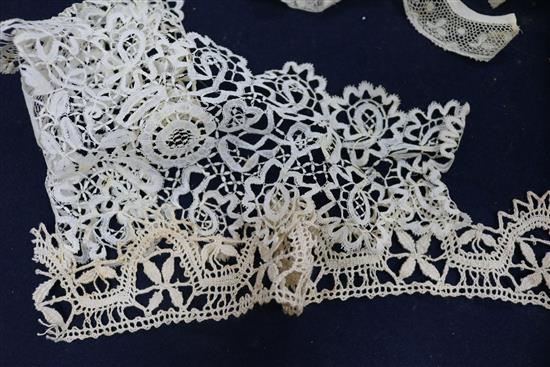 An early 18th century lace collar together with mixed needle and bobbin 19th century laces